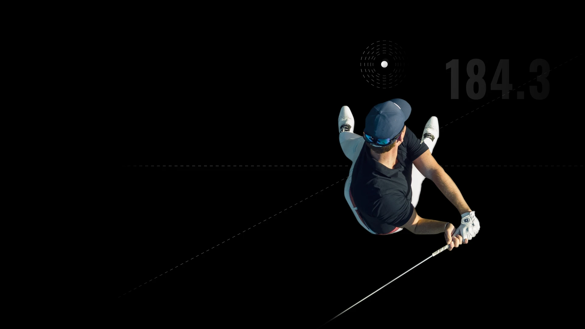 Overhead view of a golfer in mid-swing against a black background, with the number 184.3 displayed.