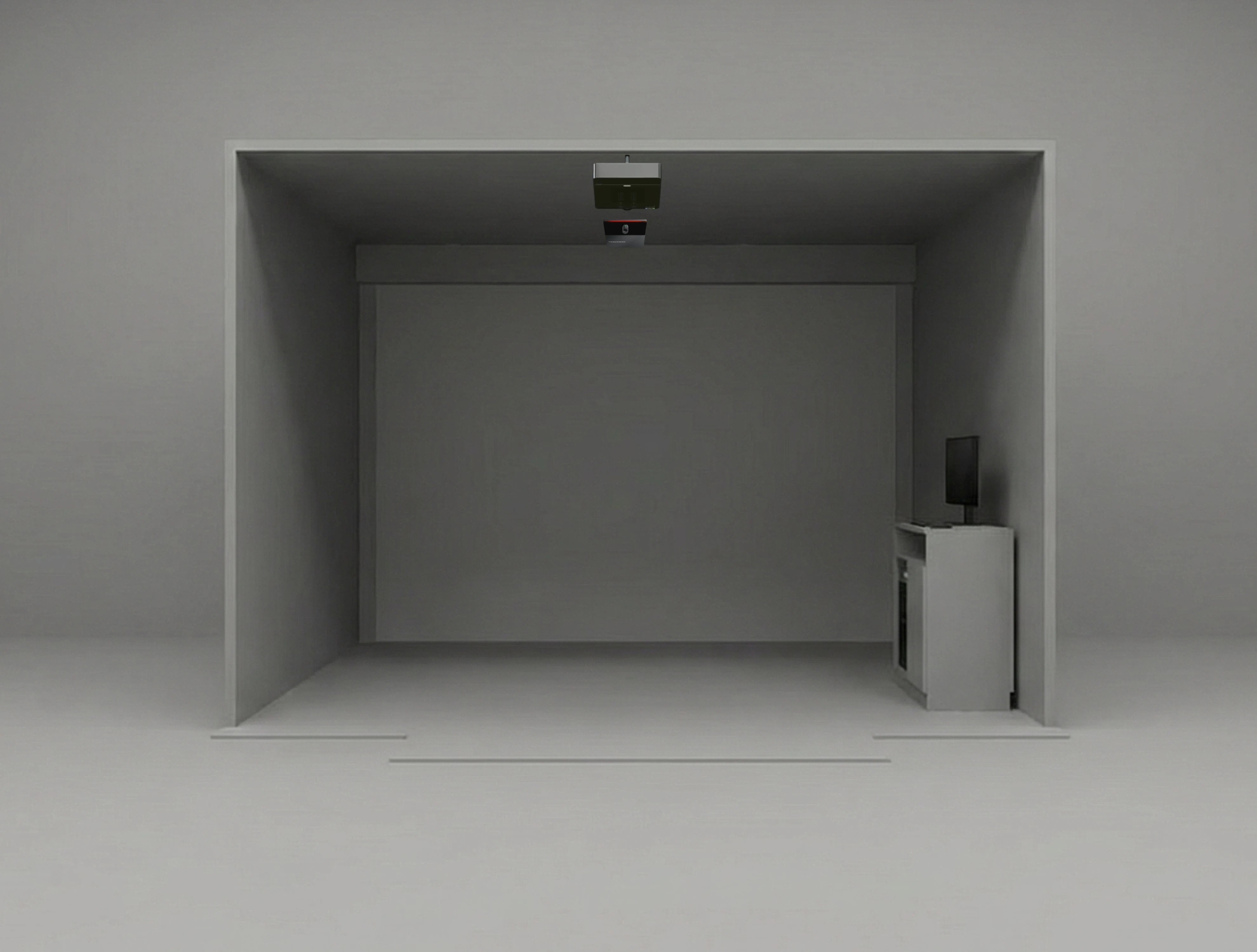 A minimalist gray room with a small monitor on a cabinet and a ceiling-mounted device facing inward.