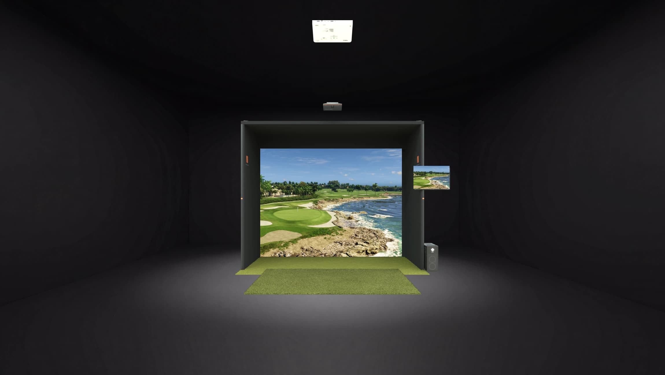 Indoor golf simulator with a virtual course displayed, featuring a coastal view, green mat, and dark room environment.