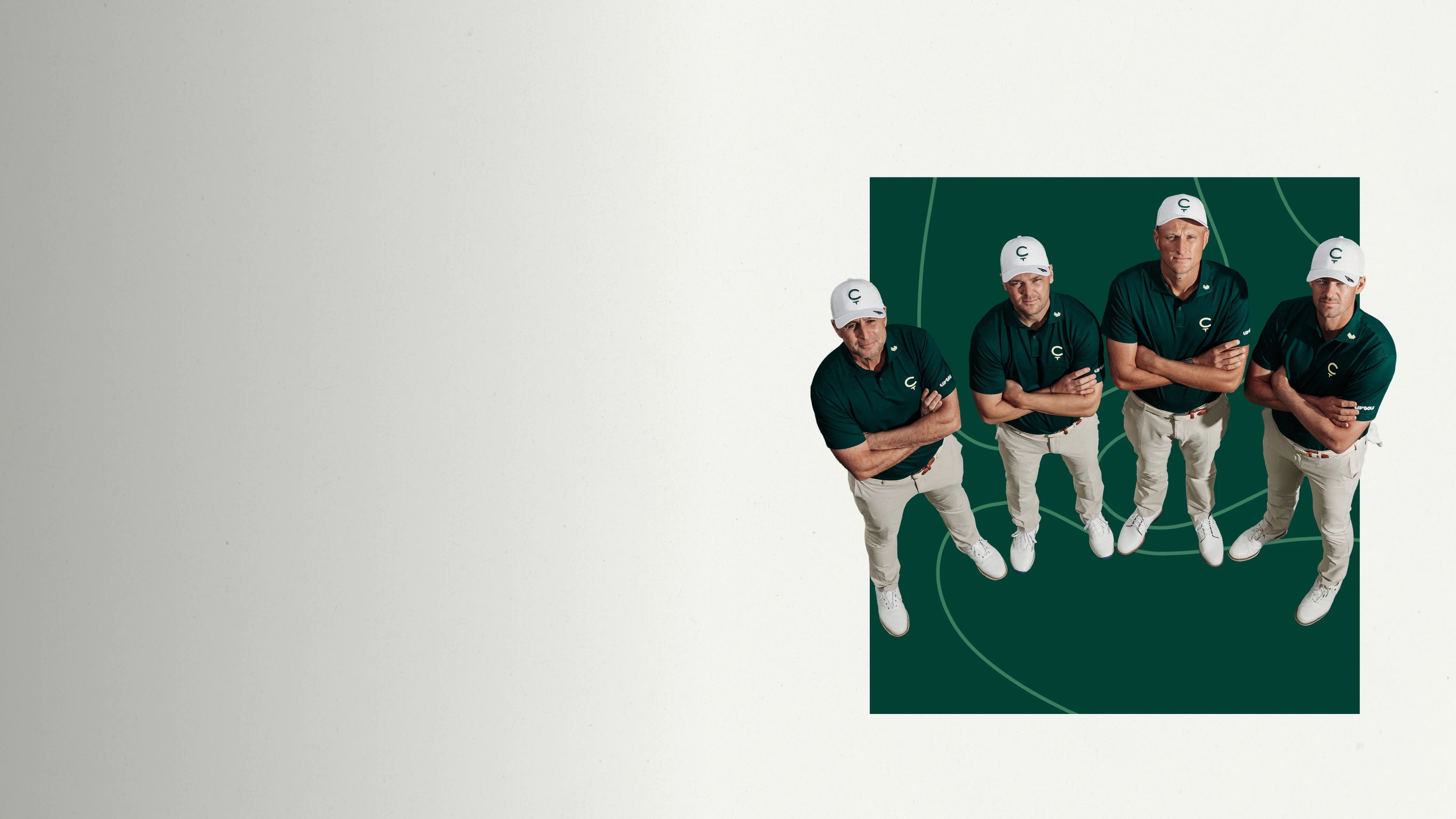 Four men in matching green shirts and white caps pose with arms crossed, standing on a green background, viewed from above.