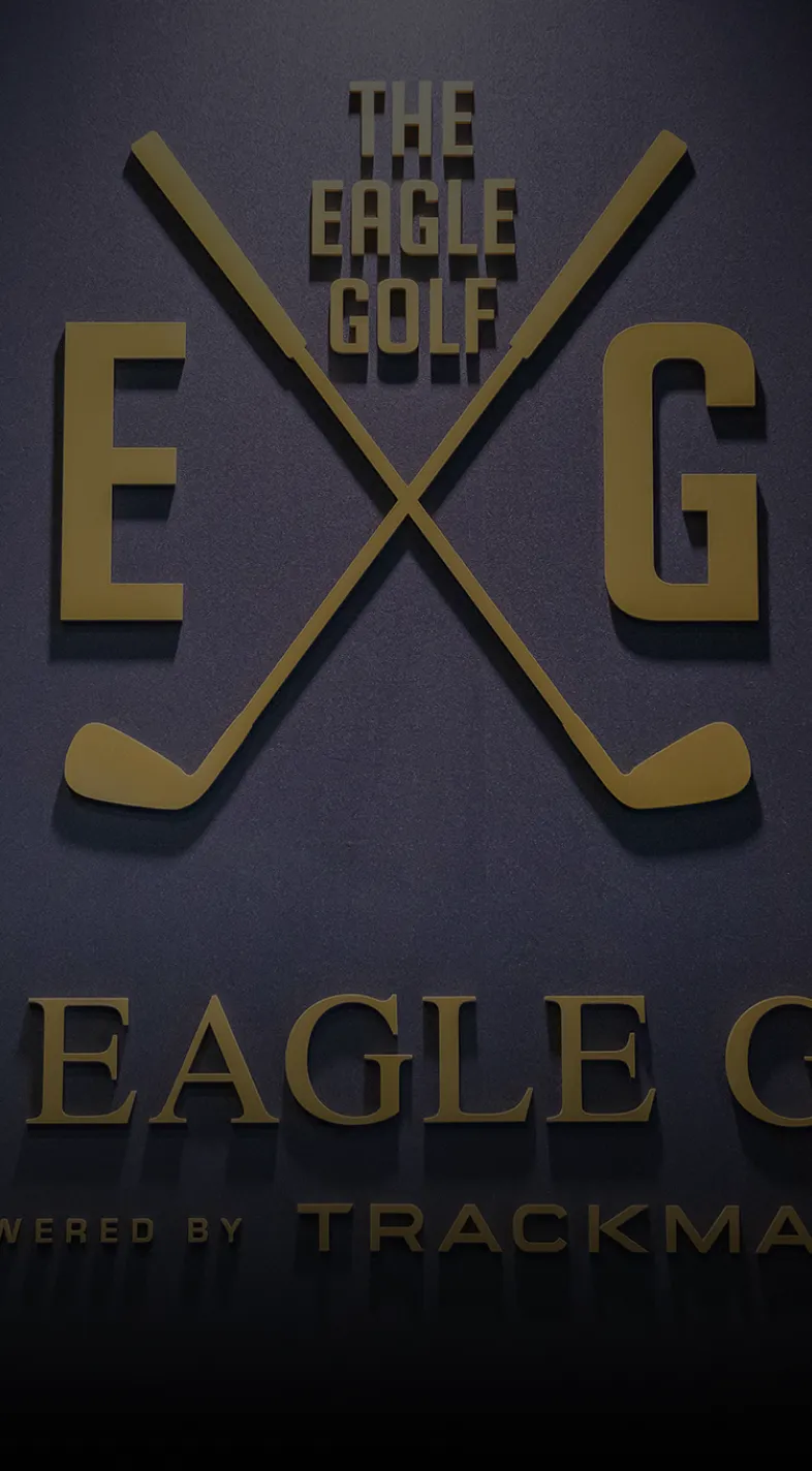 Gold logo with crossed golf clubs and text "The Eagle Golf" on a dark blue background.
